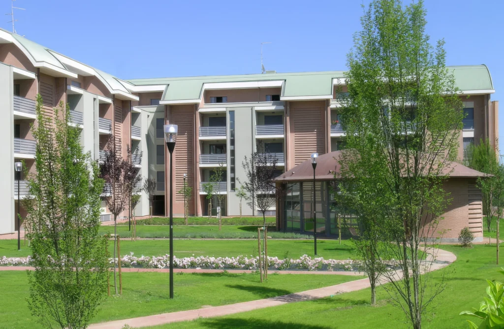 Complesso residenziale con appartamenti e giardino condominiale costruito da Impref